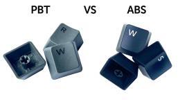Qual è la differenza tra i tasti ABS, PBT e in gomma?